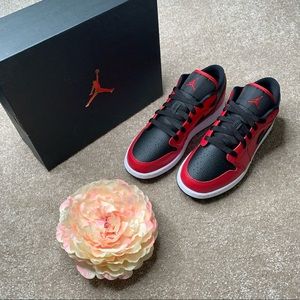Jordan 1 Low’ Red/Black Pebbled